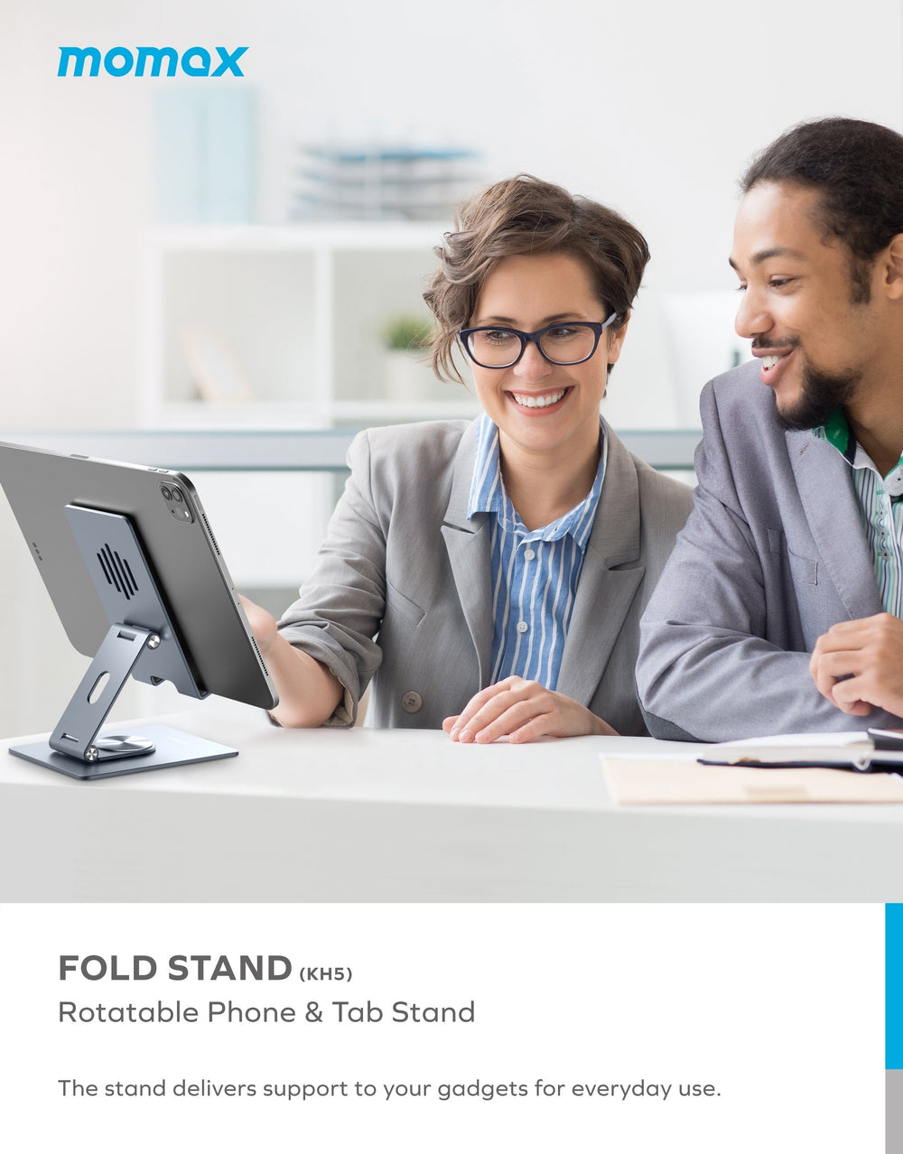 a man and woman looking at a tablet